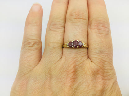 10k Yellow Gold Oval Cut Ruby July Birthstone Trinity & Diamond Ring