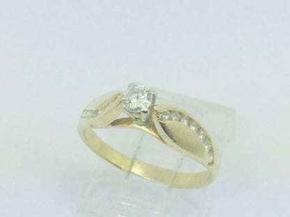 14k Yellow Gold Round Cut 31pt Diamond and Channel Set Accents Ring