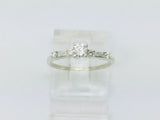 14k White Gold Round Cut 23pt Diamond with Round and Baguette Diamond Accents Ring