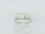 14k White Gold Round Cut 23pt Diamond with Round and Baguette Diamond Accents Ring