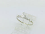 14k White Gold Round Cut 23pt Diamond with Round and Baguette Diamond Accents Ring