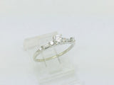 14k White Gold Round Cut 23pt Diamond with Round and Baguette Diamond Accents Ring