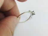 14k White Gold Round Cut 23pt Diamond with Round and Baguette Diamond Accents Ring
