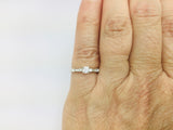 14k White Gold Round Cut 23pt Diamond with Round and Baguette Diamond Accents Ring