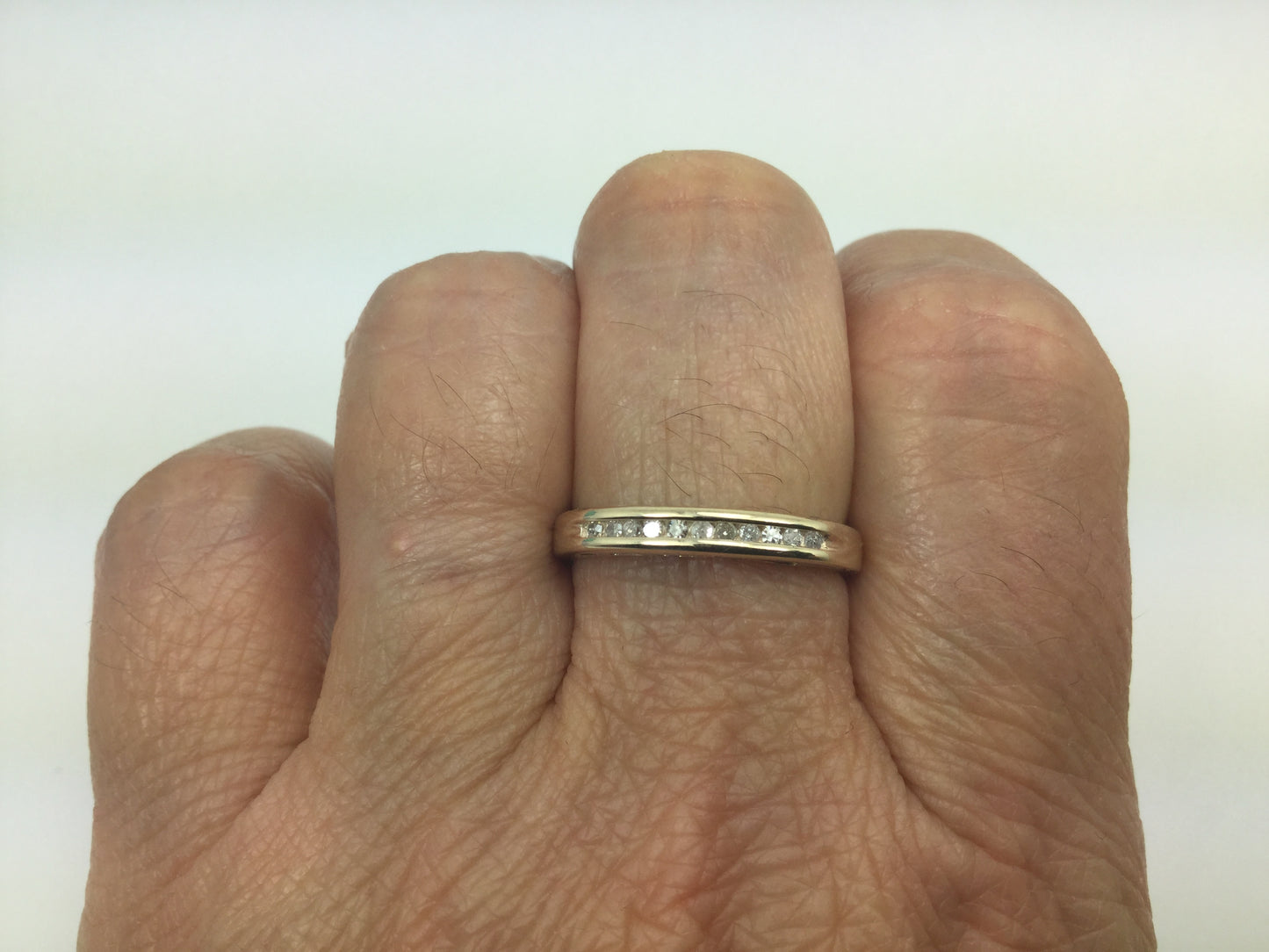 10k Yellow Gold Round Cut 11pt Diamond Channel Set Ring