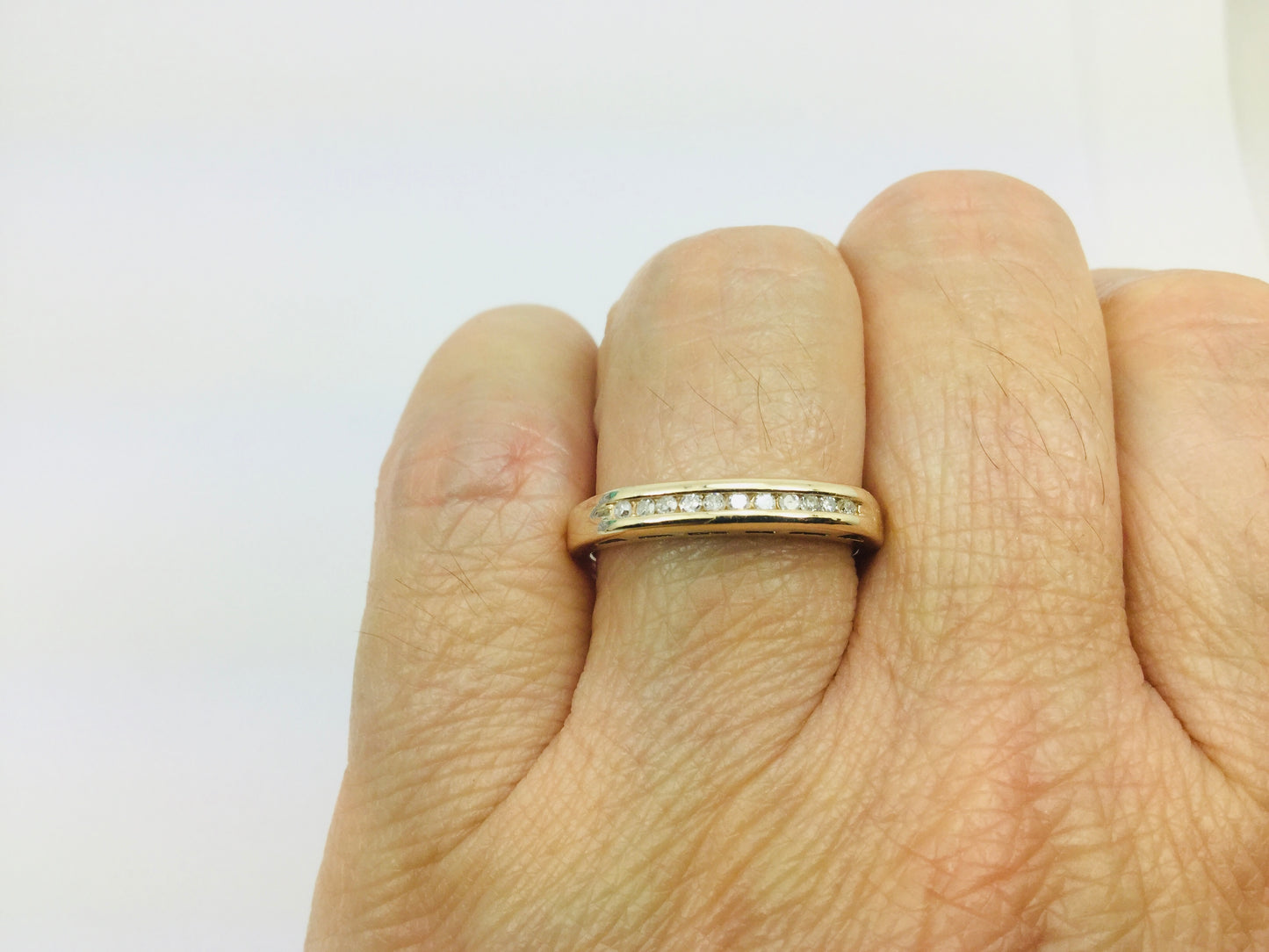 10k Yellow Gold Round Cut 0.11ct Diamond Channel Set Ring