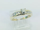 10k Yellow Gold Round Cut 7.5pt Diamond Solitaire with Accents Ring