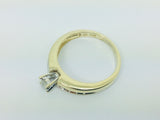 10k Yellow Gold Round Cut 7.5pt Diamond Solitaire with Accents Ring