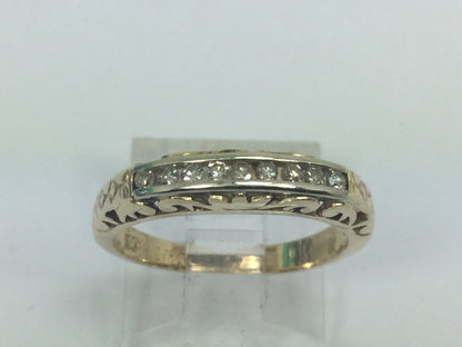10k Yellow Gold Round Cut 18pt Channel Set Diamond Ring