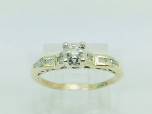 10k Yellow Gold Round Cut 15pt Diamond Illusion Set with Channel Set Accents Ring