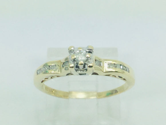 10k Yellow Gold Round Cut 15pt Diamond Illusion Set with Channel Set Accents Ring