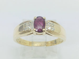 10k Yellow Gold Round Cut 50pt Ruby July Birthstone & 8pt Diamond Accent Ring
