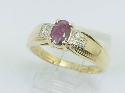 10k Yellow Gold Round Cut 50pt Ruby July Birthstone & 8pt Diamond Accent Ring