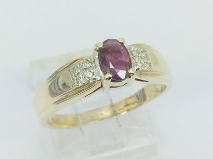 10k Yellow Gold Round Cut 50pt Ruby July Birthstone & 8pt Diamond Accent Ring