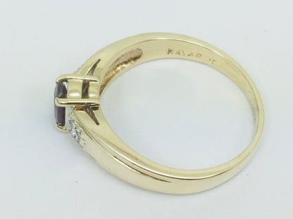 10k Yellow Gold Round Cut 50pt Ruby July Birthstone & 8pt Diamond Accent Ring