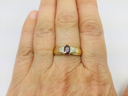 10k Yellow Gold Round Cut 50pt Ruby July Birthstone & 8pt Diamond Accent Ring