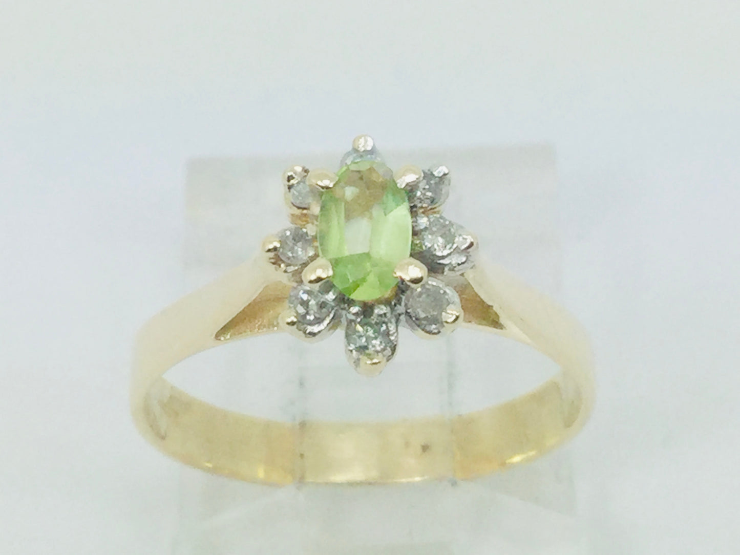 10k Yellow Gold Oval Cut 25pt Peridot August Birthstone & 8pt Diamond Halo Ring