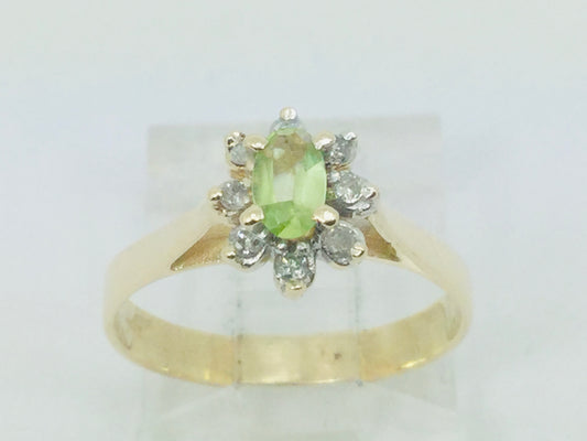 10k Yellow Gold Oval Cut 25pt Peridot August Birthstone & 8pt Diamond Halo Ring