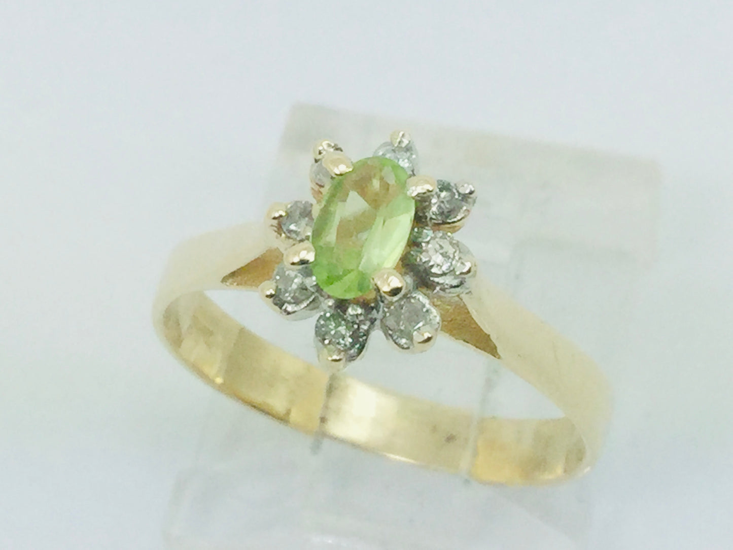 10k Yellow Gold Oval Cut 25pt Peridot August Birthstone & 8pt Diamond Halo Ring