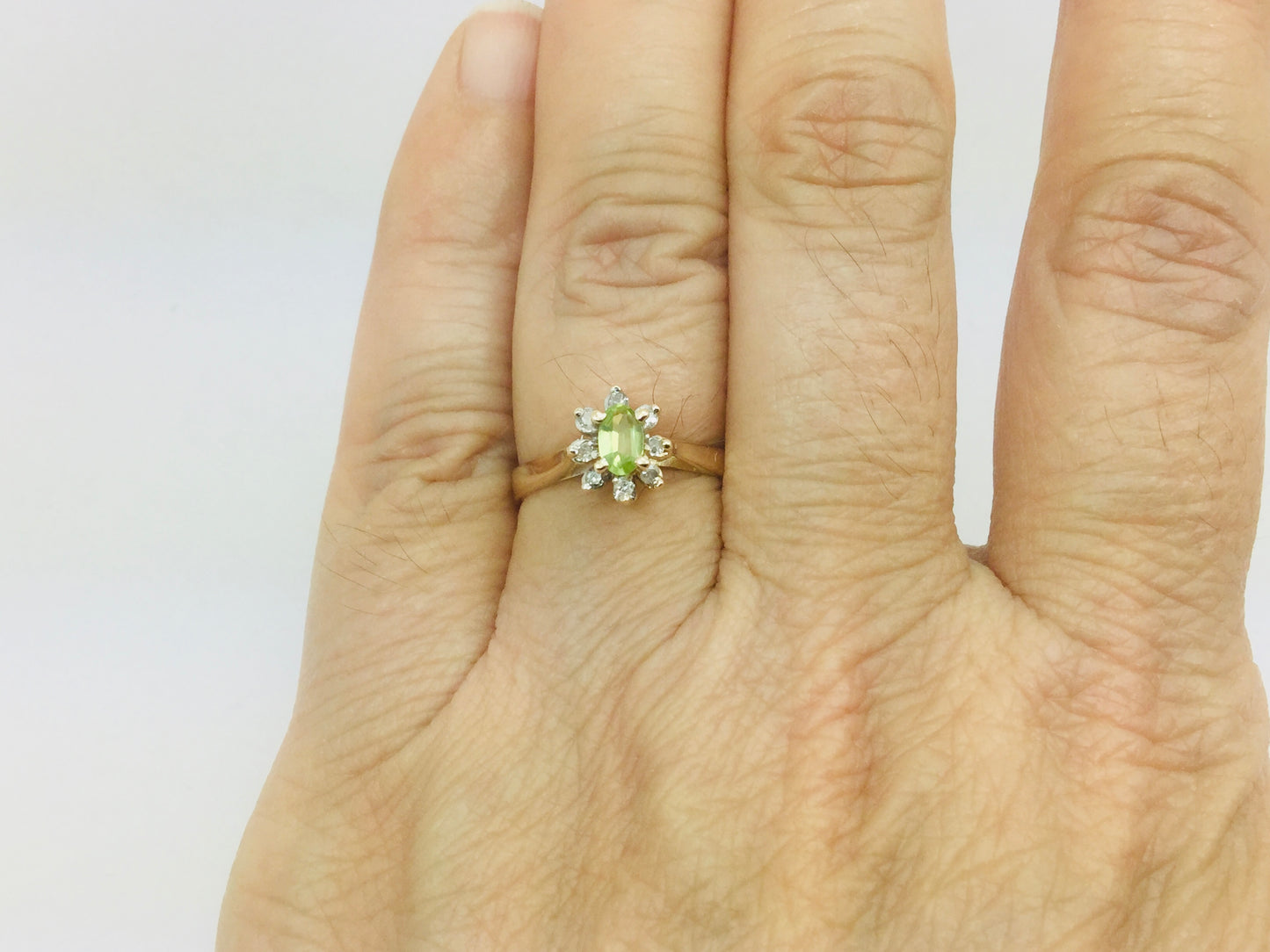 10k Yellow Gold Oval Cut 25pt Peridot August Birthstone & 8pt Diamond Halo Ring