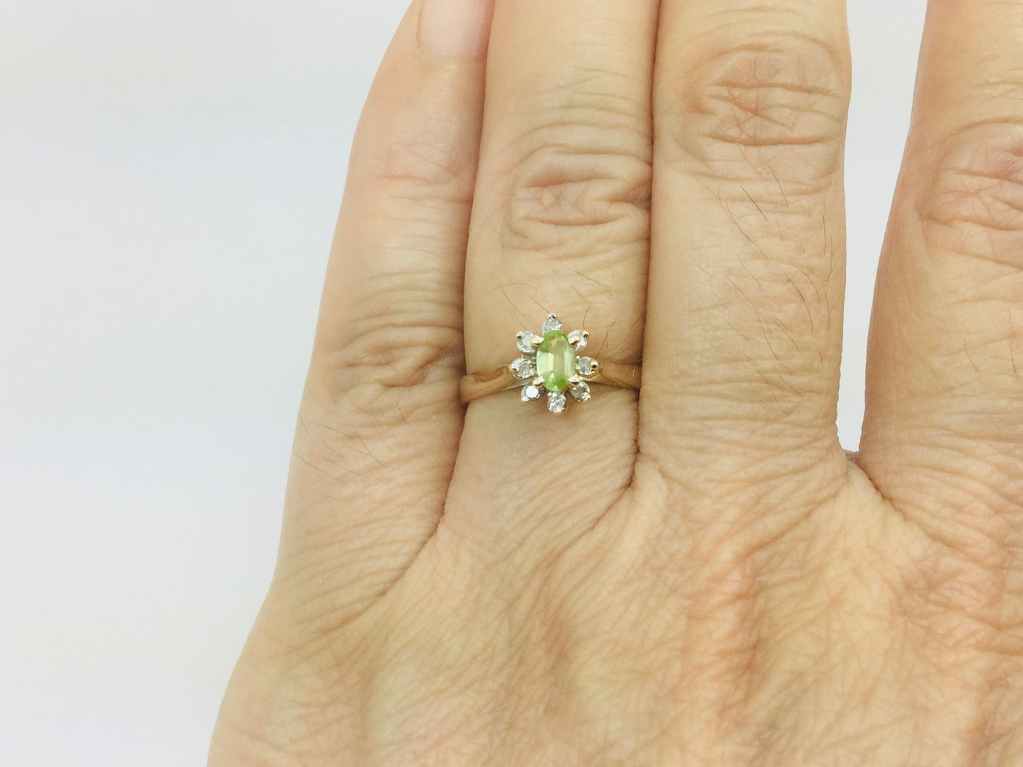 10k Yellow Gold Oval Cut 25pt Peridot August Birthstone & 8pt Diamond Halo Ring