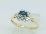 14k Yellow and White Gold Oval Cut 0.35ct Sapphire September Birthstone & 0.30ct Diamond Cluster Ring