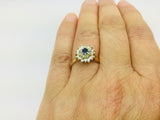 14k Yellow and White Gold Oval Cut 0.15ct Sapphire September Birthstone & 0.32ct Diamond Cluster Ring