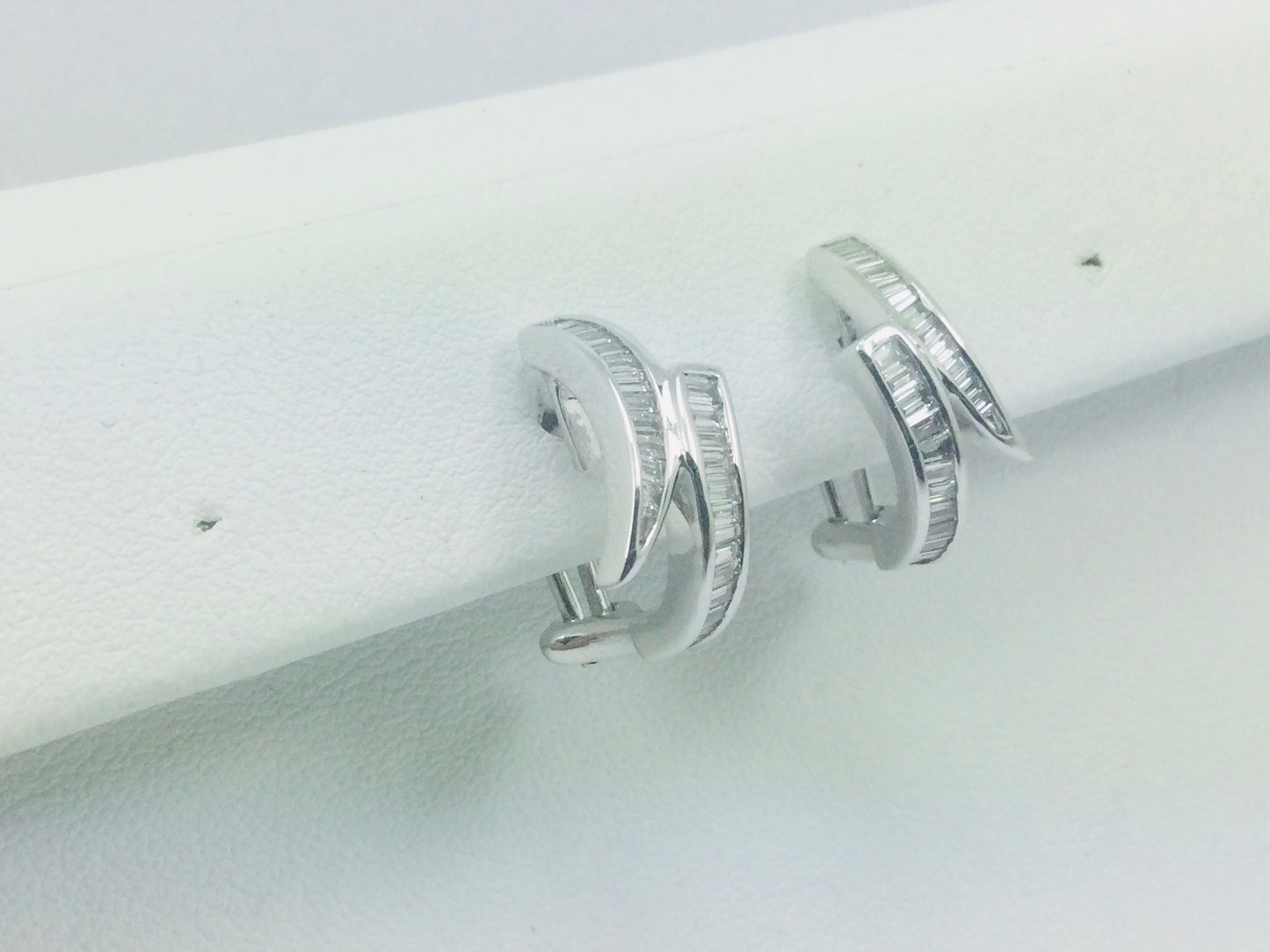18k White Gold Baguette Cut 0.85ct Diamond Row Set Omega Style Clip Earrings