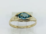 10k Yellow Gold Oval Cut 0.65ct Blue Topaz Ring