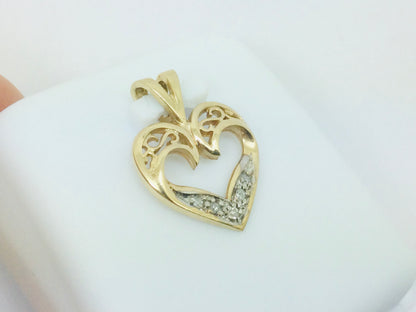 10k Yellow Gold Round Cut 5pt Diamond Heart Pendent