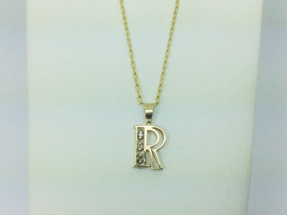 10k Yellow Gold Round Cut 3pt Diamond Initial 'R' Pendent