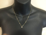 10k Yellow Gold Oval Cut 25pt Sapphire & 3pt Diamond Ribbon Pendent