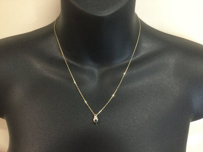 10k Yellow Gold Oval Cut 25pt Sapphire & 3pt Diamond Ribbon Pendent