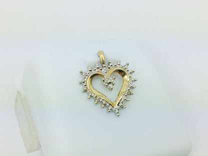 10k Yellow Gold Round Cut 7pt Diamond Heart Pendent