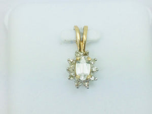 10k Yellow Gold Oval Cut 25pt Topaz & 10pt Diamond Halo Pendent