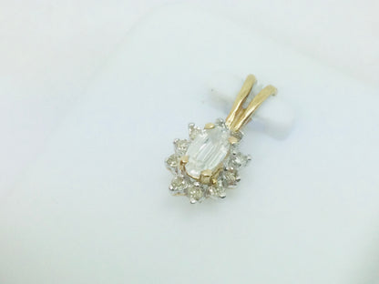 10k Yellow Gold Oval Cut 25pt Topaz & 10pt Diamond Halo Pendent