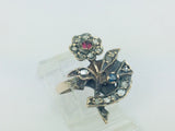 10k Yellow Gold Round Cut 22pt Diamond, 5pt Ruby, and 5pt Blue Topaz Flower Ring