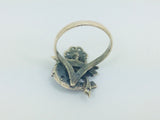 10k Yellow Gold Round Cut 22pt Diamond, 5pt Ruby, and 5pt Blue Topaz Flower Ring