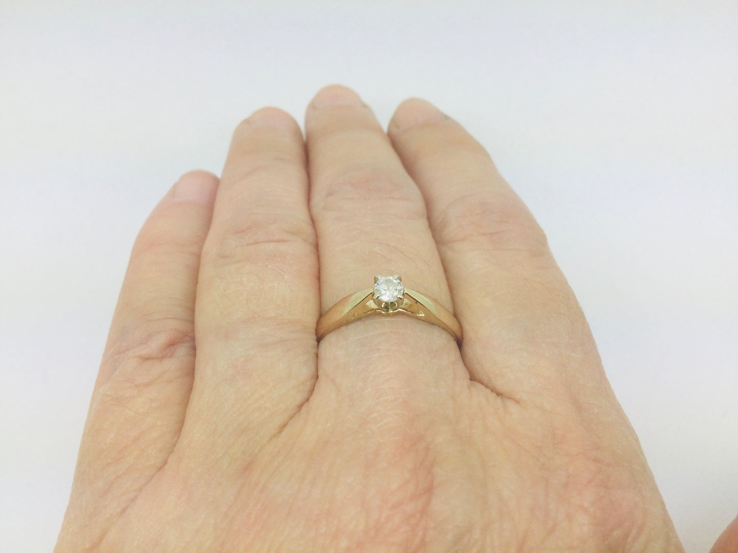 14k Yellow Gold Round Cut 0.15ct Diamond Solitaire Ring