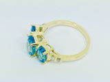 14k Yellow Gold Oval Cut Blue Topaz December Birthstone & Diamond Ring