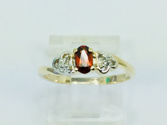 10k Yellow Gold Oval Cut Garnet January Birthstone & Diamond Ring