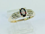 10k Yellow Gold Oval Cut Garnet January Birthstone & Diamond Ring