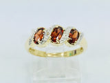 14k Yellow Gold Trinity Oval Cut Garnet January Birthstone & Diamond Ring