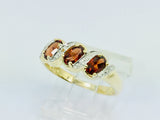 14k Yellow Gold Trinity Oval Cut Garnet January Birthstone & Diamond Ring