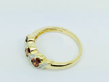 14k Yellow Gold Trinity Oval Cut Garnet January Birthstone & Diamond Ring